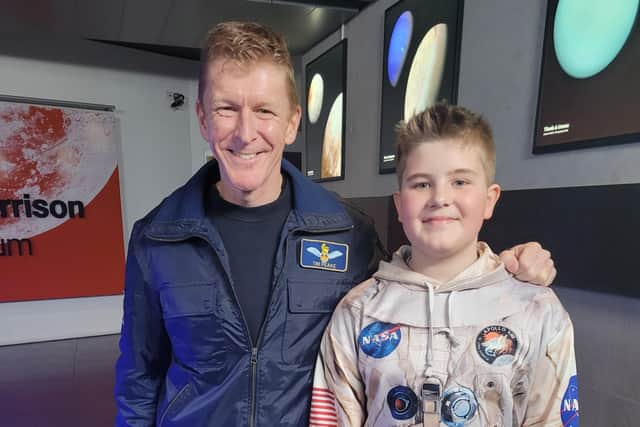 Oliver Davies, who attends Gildredge House School, with British astronaut Tim Peake at the Royal Observatory in Greenwich, London, last night (February 21). SUS-220222-171039001