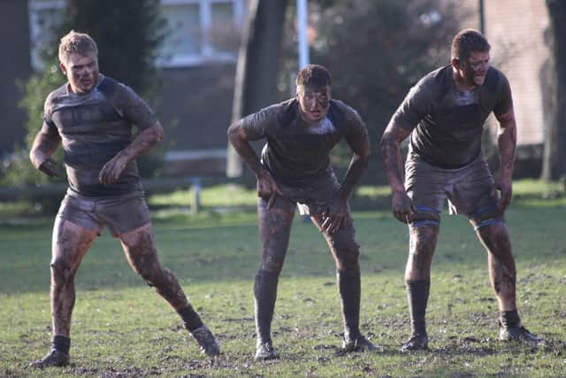 Chichester's players get caked in mud in their clash with Hammersmith and Fulham / Picture: Alison Tanner