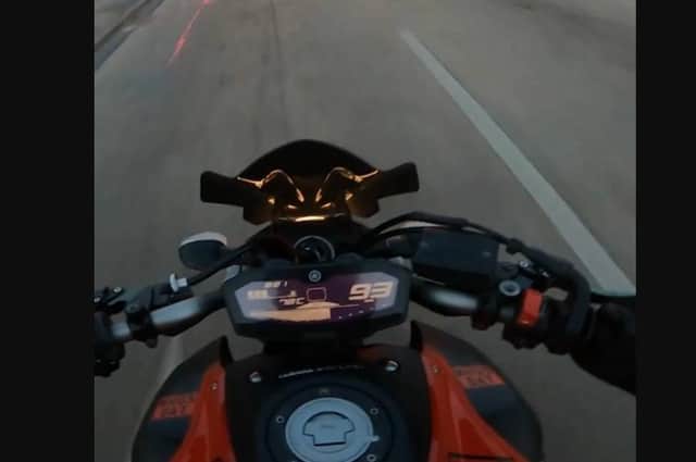 The helmet camera shows the motorcyclist's speed go up to 105mph
Photo from Sussex Police