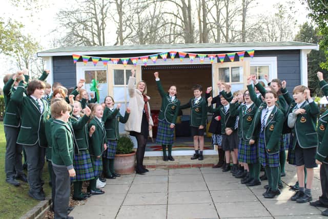 The Oakwood School head boy and head girl officially opened the new Harmony Hut