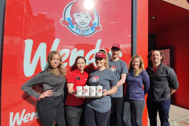 Wendy's staff outside the new restaurant in Brighton