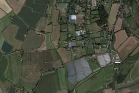 SI/21/03524/FUL: 12 Cow Lane, Sidlesham. To demolish existing glasshouses and replace with a new glasshouse. Alterations to access including repositioning 15m to the east. Photo: Google Maps.