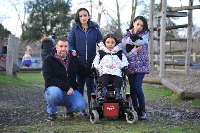Fishbourne Playing Fields Association Trustee's have launched a campaign to try and make the playpark more inclusive for everyone. Martin Weller, Claudia and their children Sofia (right) and Leah. Pic S Robards SR2202232 SUS-220225-110321001