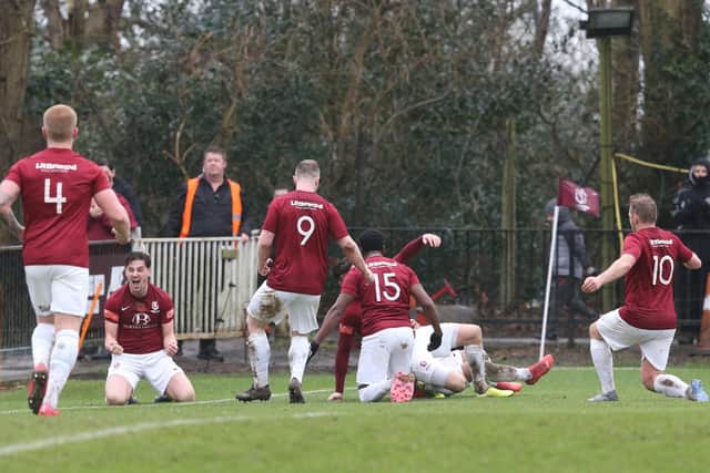 Hastings United players celebrate Jack Dixon's goal / Picture: Scott White