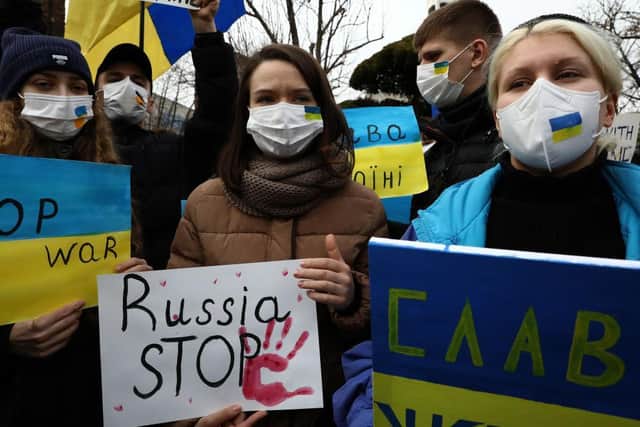 EOUL, SOUTH KOREA - FEBRUARY 28: South Korean activists and Ukrainians attend a rally against Russia attacking Ukraine near the Russian embassy on February 28, 2022 in Seoul, South Korea. Protests have erupted around the world in support of Ukraine after Russian forces invaded the country earlier this week. (Photo by Chung Sung-Jun/Getty Images)