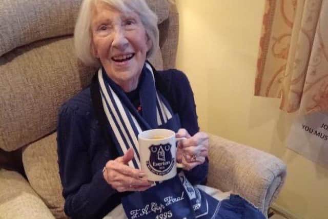 Joan Moody with her Everton mug