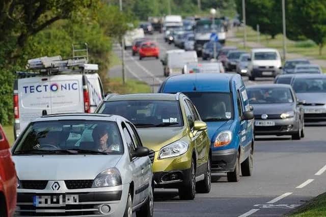 The A259 is partially blocked near Bexhill following a three-vehicle crash, according to the AA