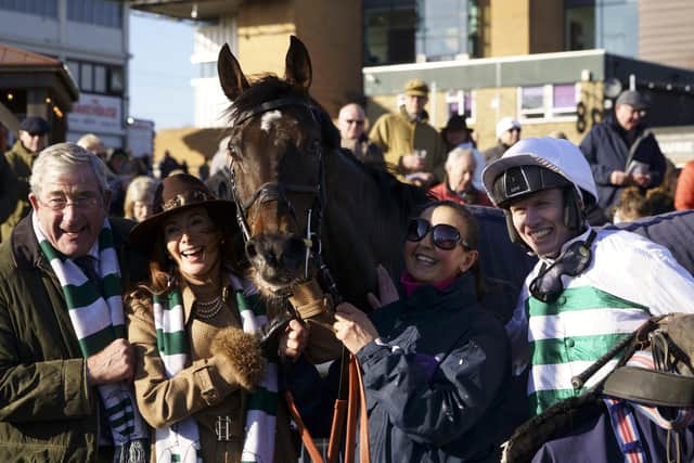 Connections celebrate Botox Has' win in the National Spirit Hurdle for the Moores / Picture: Clive Bennett