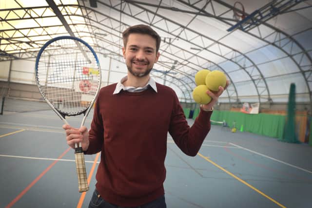 Reporter Jacob Panons at the visually impaired tennis session. SUS-220225-141121001