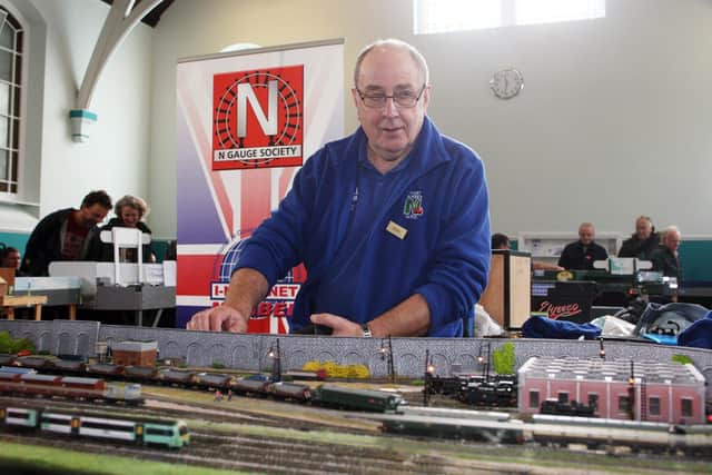 Nigel Appleton with West Sussex N Gauge Model Railway Club's biggest layout. Photo by Derek Martin DM19110969a