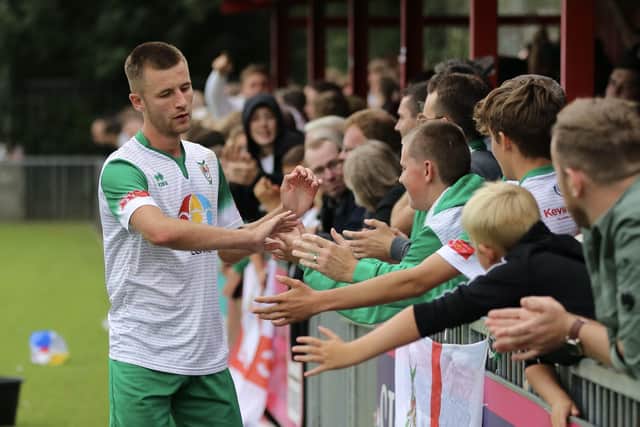 Ashton Leigh with Rocks fans after their win at Worthing earlier this season / Picture: Martin Denyer