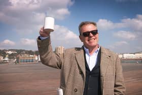 Suggs, from Madness, enjoying a cup of tea on Hastings pier in March 2016.
