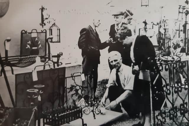 Frederick Stacey, who was secretary of the West Sussex branch of the National Master Blacksmiths and Agricultural Engineers Association, and his wife at a county show exhibit in Eastbourne