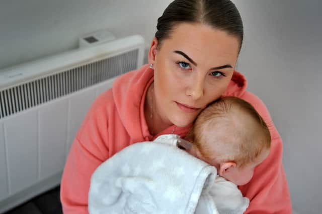 Mum Hannah Chilcott with her baby daughter. Pic S Robards SR2203023 SUS-220203-165551001