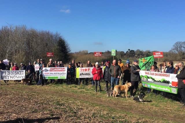 Leaders of local environmental groups heard from local people about the effect the bypass would have on the village of Binsted Photo: Matilda Tristram
