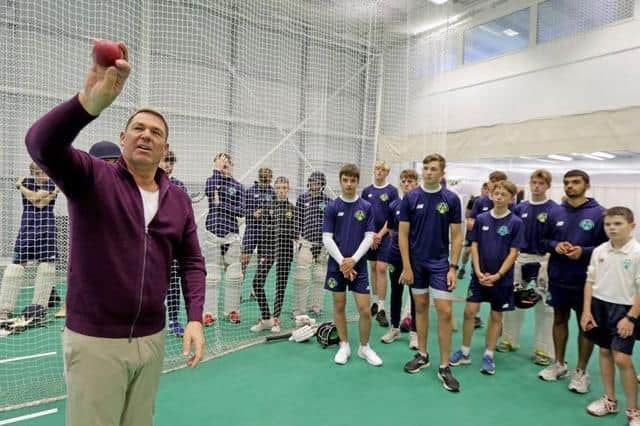 Shane Warne passes on some top tips to young players in Brighton last October