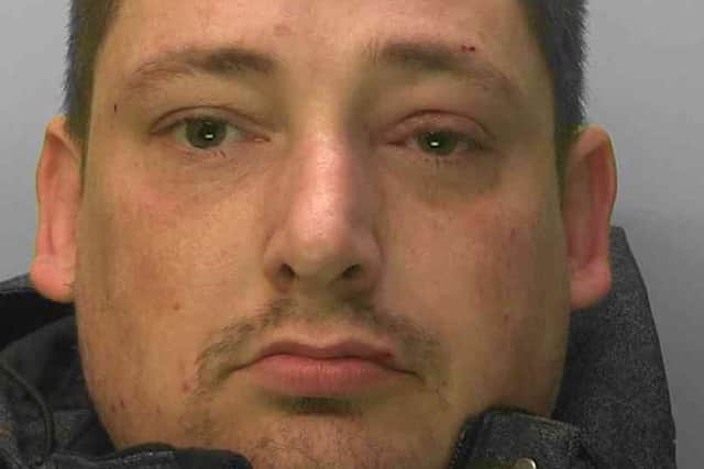 Police are looking for information on the whereabouts of Robert Cox, 36, who is wanted on a recall to prison. Picture courtesy of Sussex Police