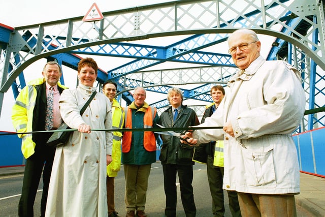 Cllr Ben Franklin reopens the Crescent Bridge with councill officials and contractors after major works.