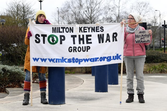 Protesters with anti war placards and banners joined the rally organised by Milton Keynes Peace and Justice Network