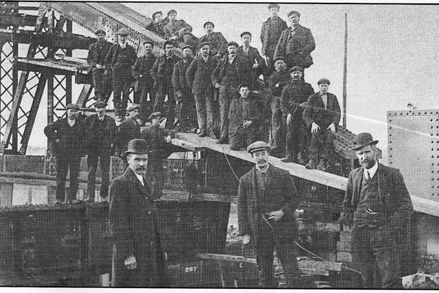 Construction workers on Crescent Bridge in 1913.