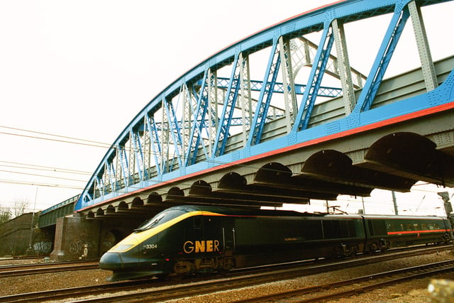 A high speed train under Crescent Bridge.