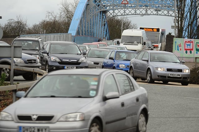 Motorists queue on Crescent Bridge as the city centre fills with bargain hunters in 2010.