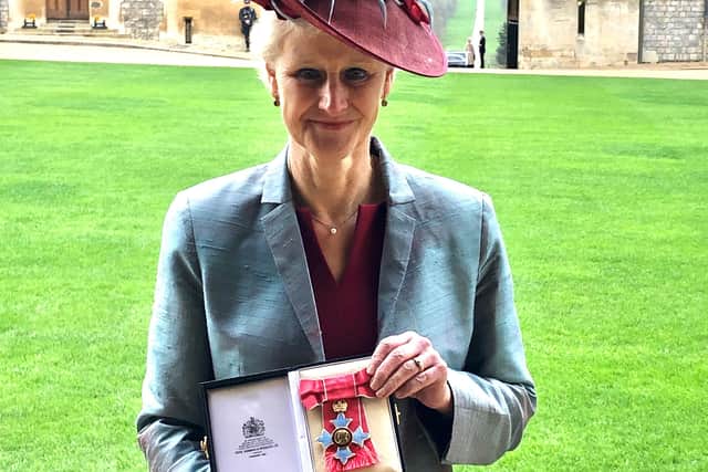 Former Chichester College chief executive Shelagh Legrave is presented with a CBE at Windsor Castle SUS-220703-142930003