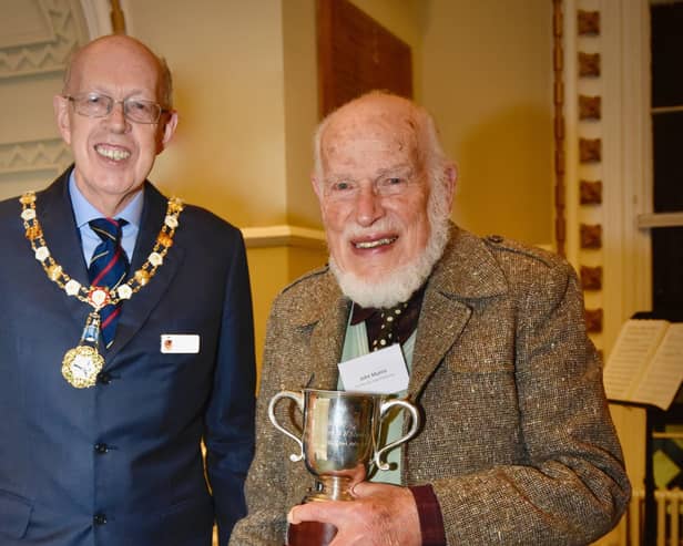 John Munro was presented with the Arundel Community Cup  by Arundel mayor Tony Hunt in December to mark his contribution to life in the town as a long-standing resident
