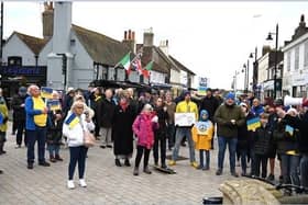 People gathered around the monument in Shoreham to listen to a series of speeches from UK citizens and Ukrainians. Photo: Jeremy Gardner