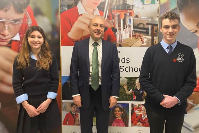 Arundel and South Downs MP Andrew Griffith with Downlands Community School prefects, Emma and George, Year 10