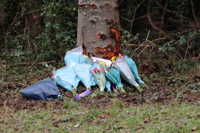 Flowers have been placed at the scene of the collision