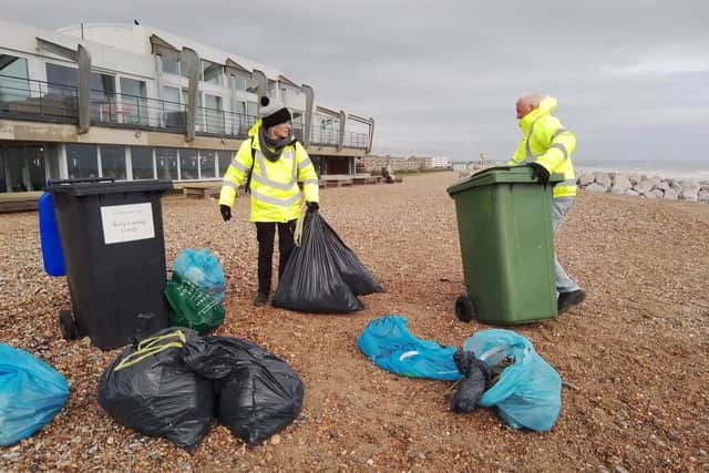 Hundreds of bottles were found washed up on Worthing and Lancing beaches. The council and members of the public helped to clean them up. Photo: Eddie Mitchell