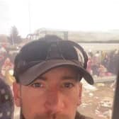 Veteran British Army sniper Shane Matthew, pictured, pictured as he passes thousands of refugees in scenes he described as 'heartbreaking'