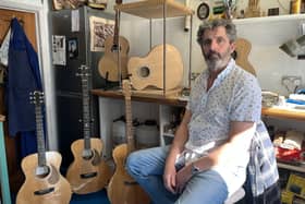 Tony Lockwood, a retired tool maker, enjoys creating his own guitars in his spare time