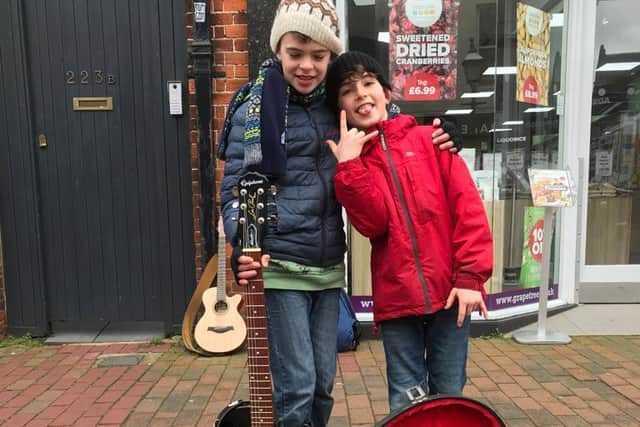 Jack Henry (10) and his friend Soren Allan (9) performed with an electric guitar and Cajon drum a set of predominately their own songs on Saturday, March 5.