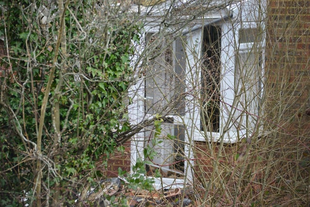 Derelict bungalow 24 Ironlatch Avenue, St Leonards. SUS-221003-105255001