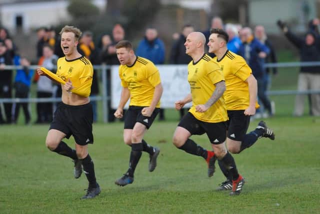 Littlehampton Town celebrate on their way to beating Brockenhurst in the last round of the Vase / Picture: Stephen Goodger