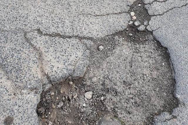 potholes at Larkfield Close, St Leonards SUS-221003-150217001