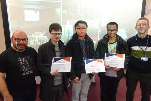 Collyer's mathematic challenge winners. From left to right: Dr Nicos Geogiou, Ben Toth, Evan Fung, Daniel Wright and Peter Mattock