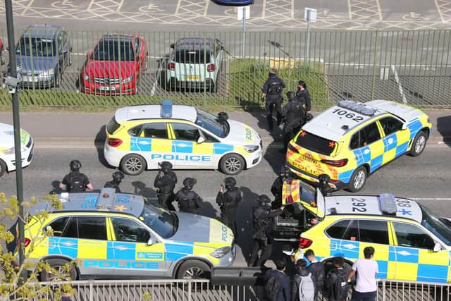 Armed police attend the incident at Crawley College last April