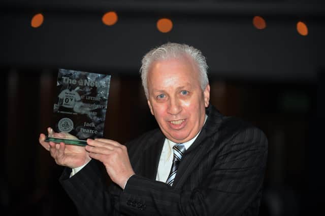 Jack Pearce the award winner - with an award from The News for his services to non-league football in 2008