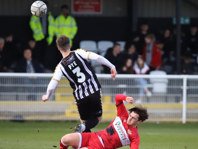 Jack Smith slides in to make a challenge
