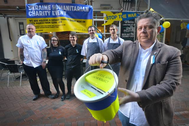 White's Seafood & Steak Bar in Hastings Old Town is raising money for Ukraine.

Restaurant owner Alex White is pictured with some of the team. SUS-220314-131354001