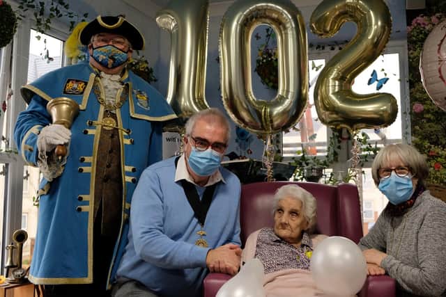 Audrey Moore celebrated her 102nd birthday at Haviland House with Worthing deputy mayor and mayoress Richard and Sally Nowak and Worthing town crier Bob Smytherman