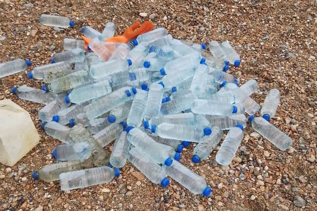 Hundreds of bottles were found washed up on Worthing and Lancing beaches. Photo: Eddie Mitchell