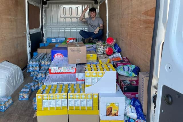 Finn Paisley and his father Richard are helping deliver food and supplies to Ukrainian refugees in Poland. Picture: Richard Paisley.