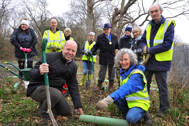 MSDC vice-chairman Phillip Coote with Id Verde, County Tree Surgeons and volunteers at Ashenground Woods. Picture: Mid Sussex District Council.