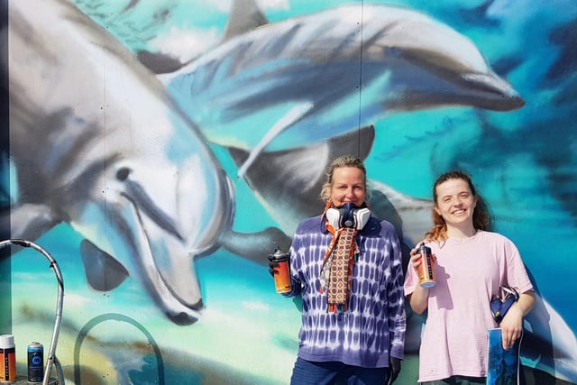 "What a wonderful picture of dolphins! Brightens the seafront up ready for the summer season!" said Bob Newton, who took this photo of street artists Iamsos.com, aka Sarah Gillings, and Zara Wilkins painting a mural on a boarded up seafront shelter at Eastbourne. SUS-220315-134023001
