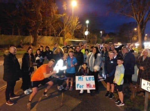 More than 50 people were waiting to run Cameron's last mile with him