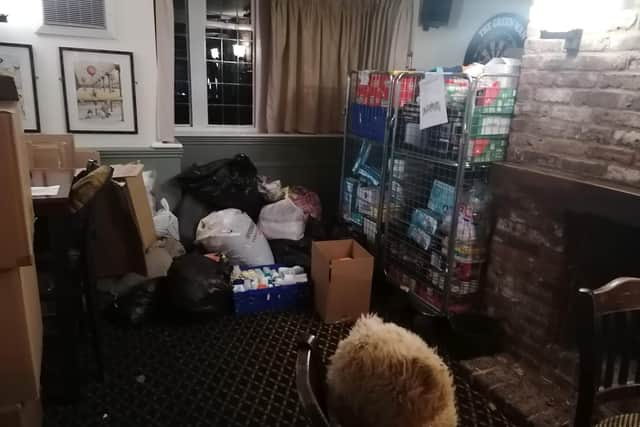 Kevin Miller, 55, has been collecting donations from the Green Man pub and Grounded At The Forge coffee shop in the village.